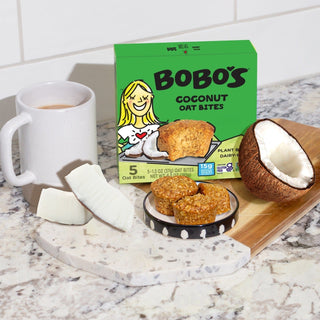 Oat bite with surrounding coconut chunks