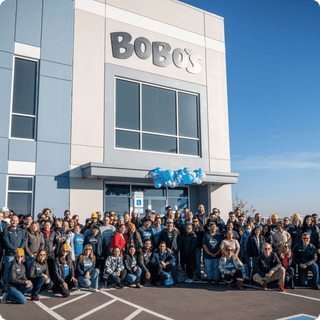Bobo's team members outside of Bobo's building